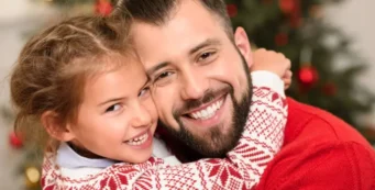 father and daughter at Christmas